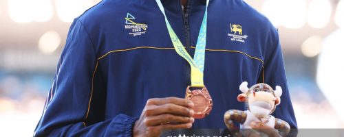 BIRMINGHAM, ENGLAND - AUGUST 04: Bronze medalist Yupun Abeykoon of Team Sri Lanka poses for a photo during the medal ceremony for the Men's 100m Final on day seven of the Birmingham 2022 Commonwealth Games at Alexander Stadium on August 04, 2022 in Birmingham, England. (Photo by Michael Steele/Getty Images)
